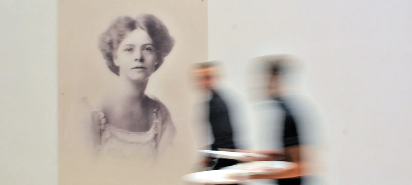 A portrait of Monica Brewster on the eatery wall